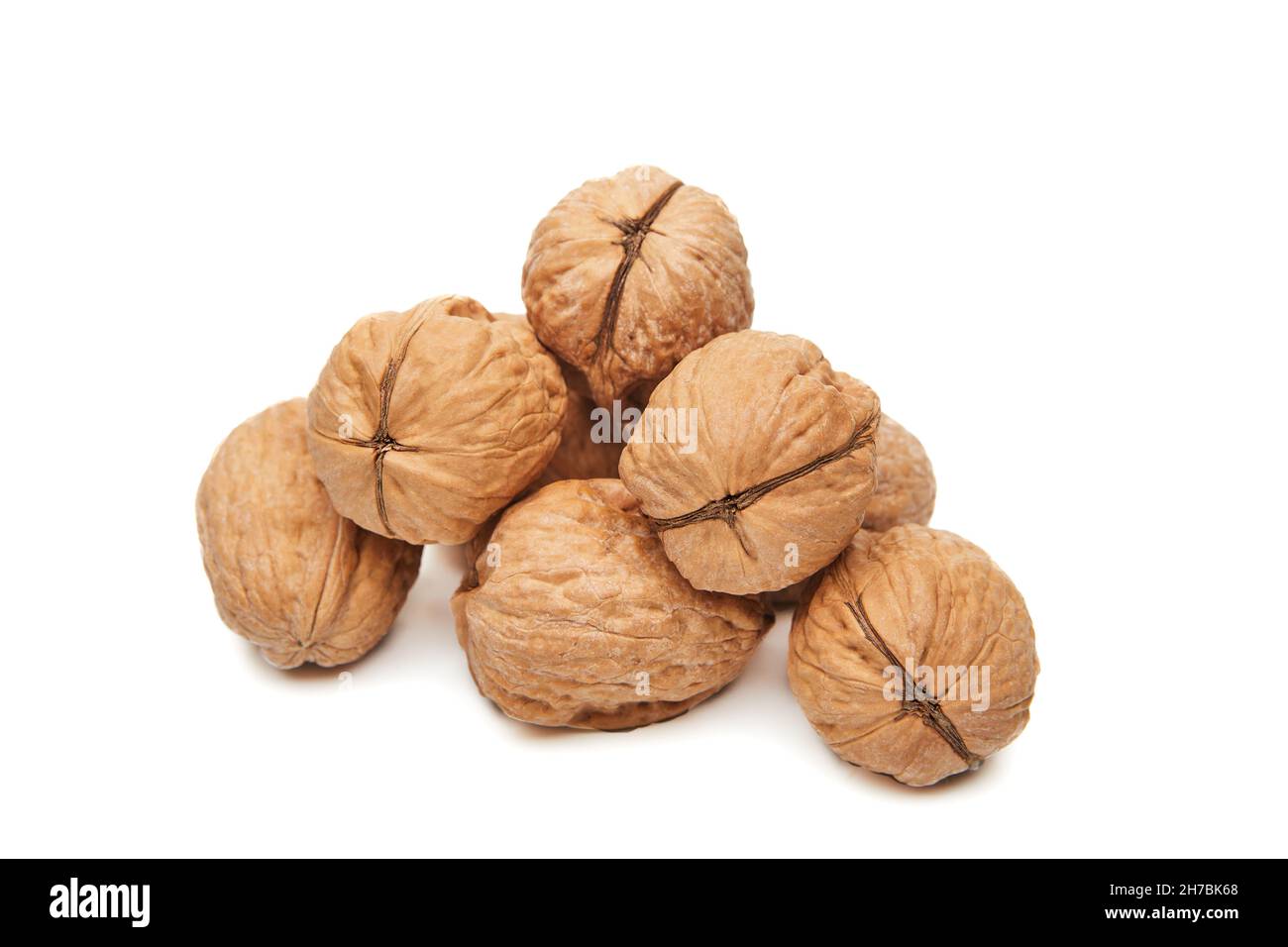 Walnuts heap isolated on a white background Stock Photo