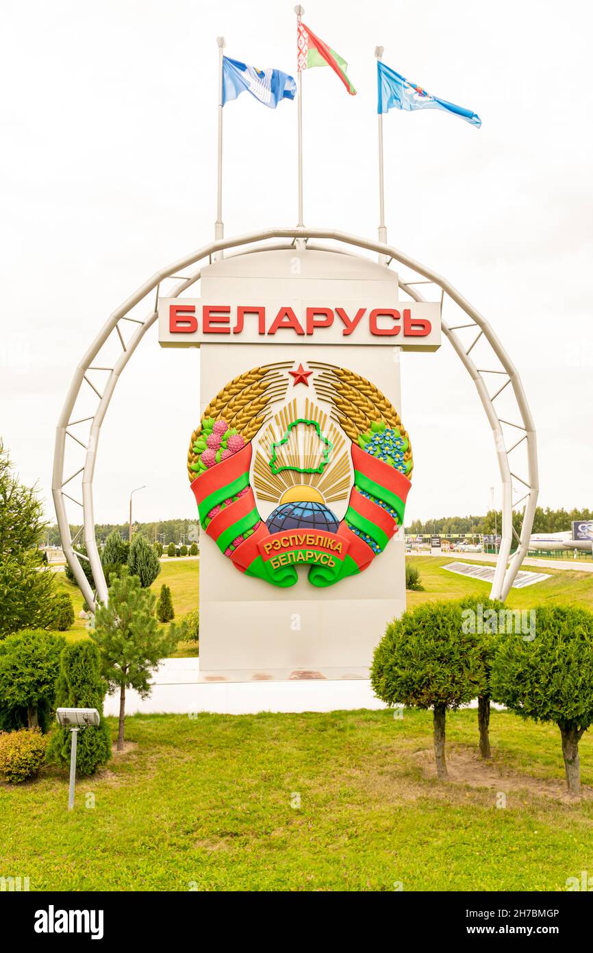 Belarus large coat of arms on a big round stand at the Minsk airport premises Stock Photo