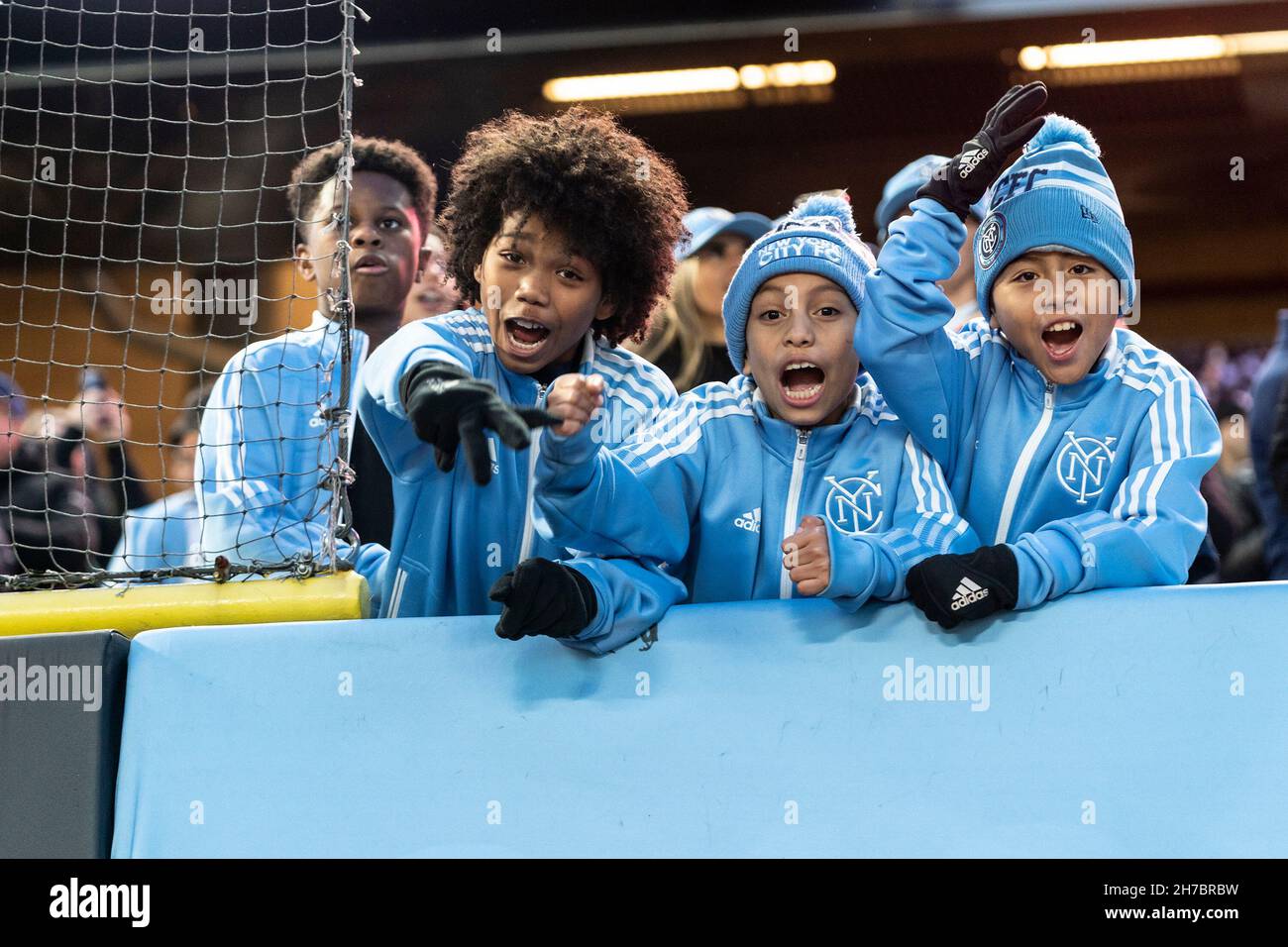 New York, United States. 21st Nov, 2021. Smiling young fans of NYCFC seen during first round game of MLS Cup versus Atlanta United on Yankee stadium. NYCFC won 2 - 0 and progressed to semifinal of MLS Cup. They will play New England Revolution for the place in Eastern Conference final. (Photo by Lev Radin/Pacific Press) Credit: Pacific Press Media Production Corp./Alamy Live News Stock Photo