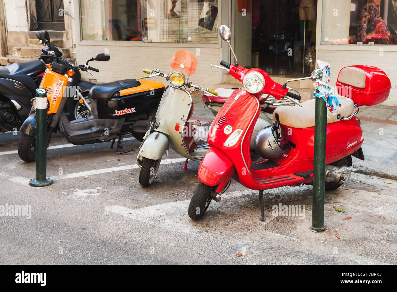 Genova, Italy - August 17, 2018: Classic Italian scooters stands parked on a roadside Stock Photo