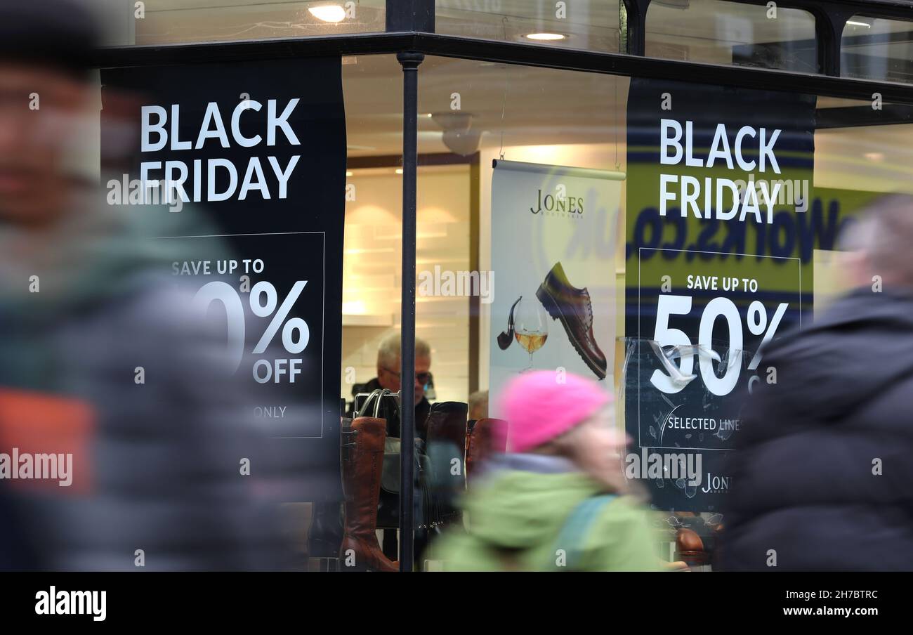 File photo dated 22/11/18 of shops in Canterbury, Kent, displaying offer posters ahead of Black Friday sales. Scam online shopping 'bargains' that turned out to be too good to be true cost shoppers £15.4 million over Christmas last year, according to police. Issue date: Monday November 22, 2021. Stock Photo