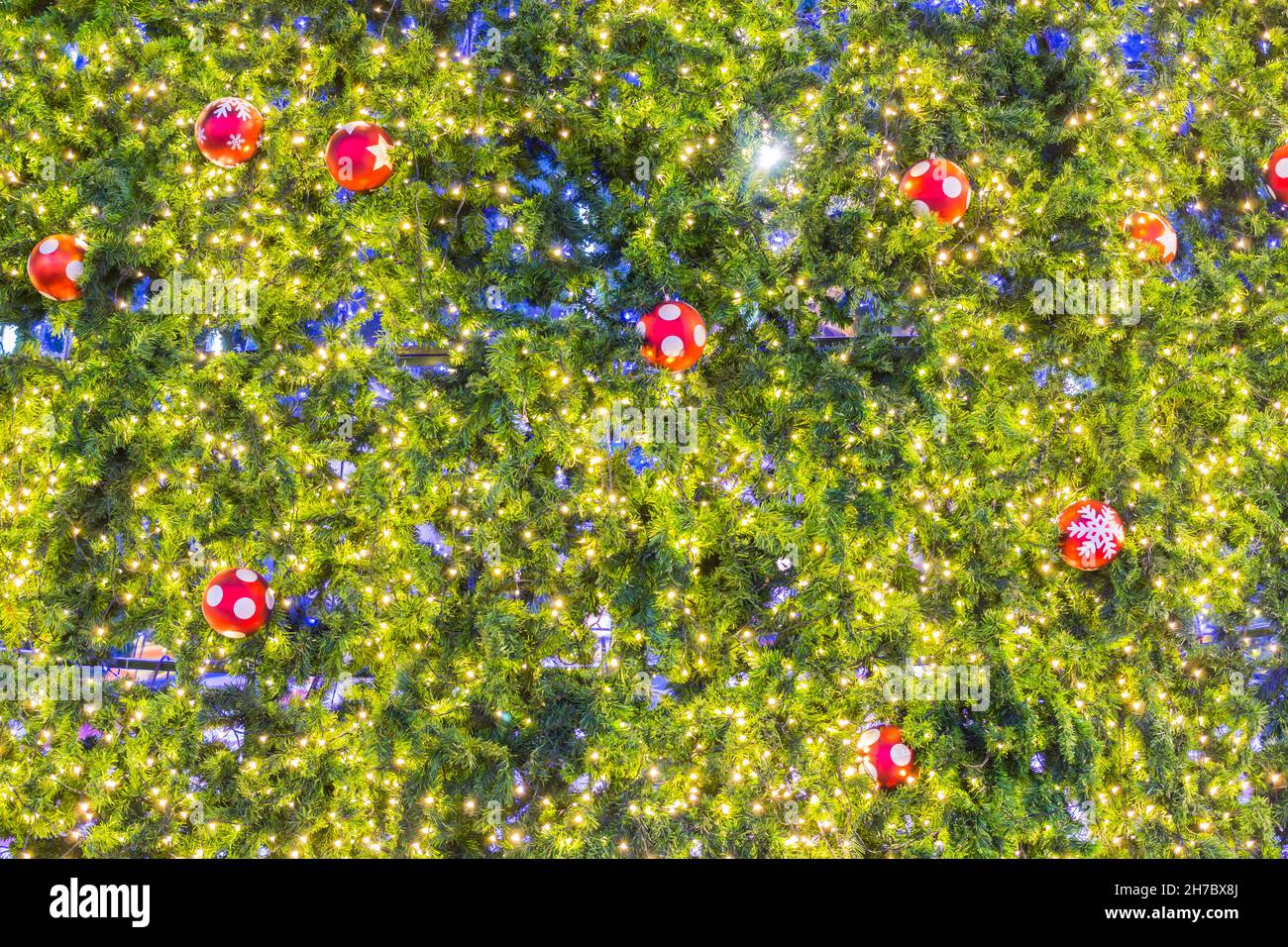 Christmas tree with colorful balls and gift background Stock Photo - Alamy