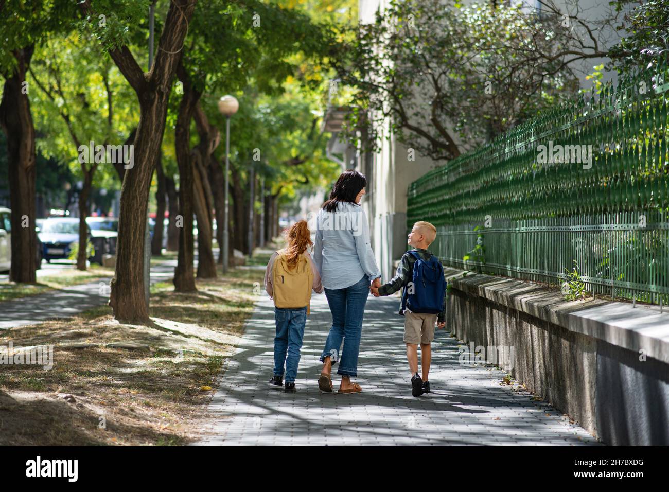 Boy walking rear view school hi-res stock photography and images - Alamy