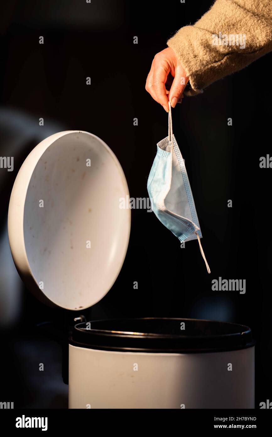 mask in bin, rubbish, garbage and trash. Littering a safety mask in Australia Stock Photo Alamy