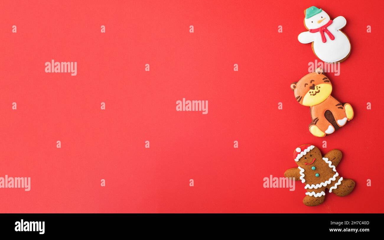 Set of traditional Christmas gingerbread on bright red background party ...
