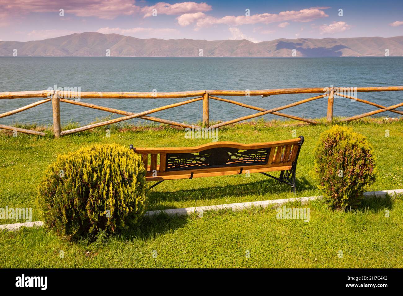 bench at the Sevan lake in Armenia. Great rest place and viewpoint Stock Photo