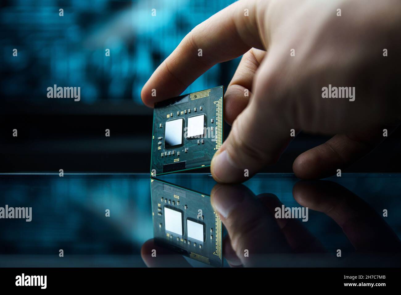 Computer chip in hands. A chipset is a set of electronic component that is integrated and flows