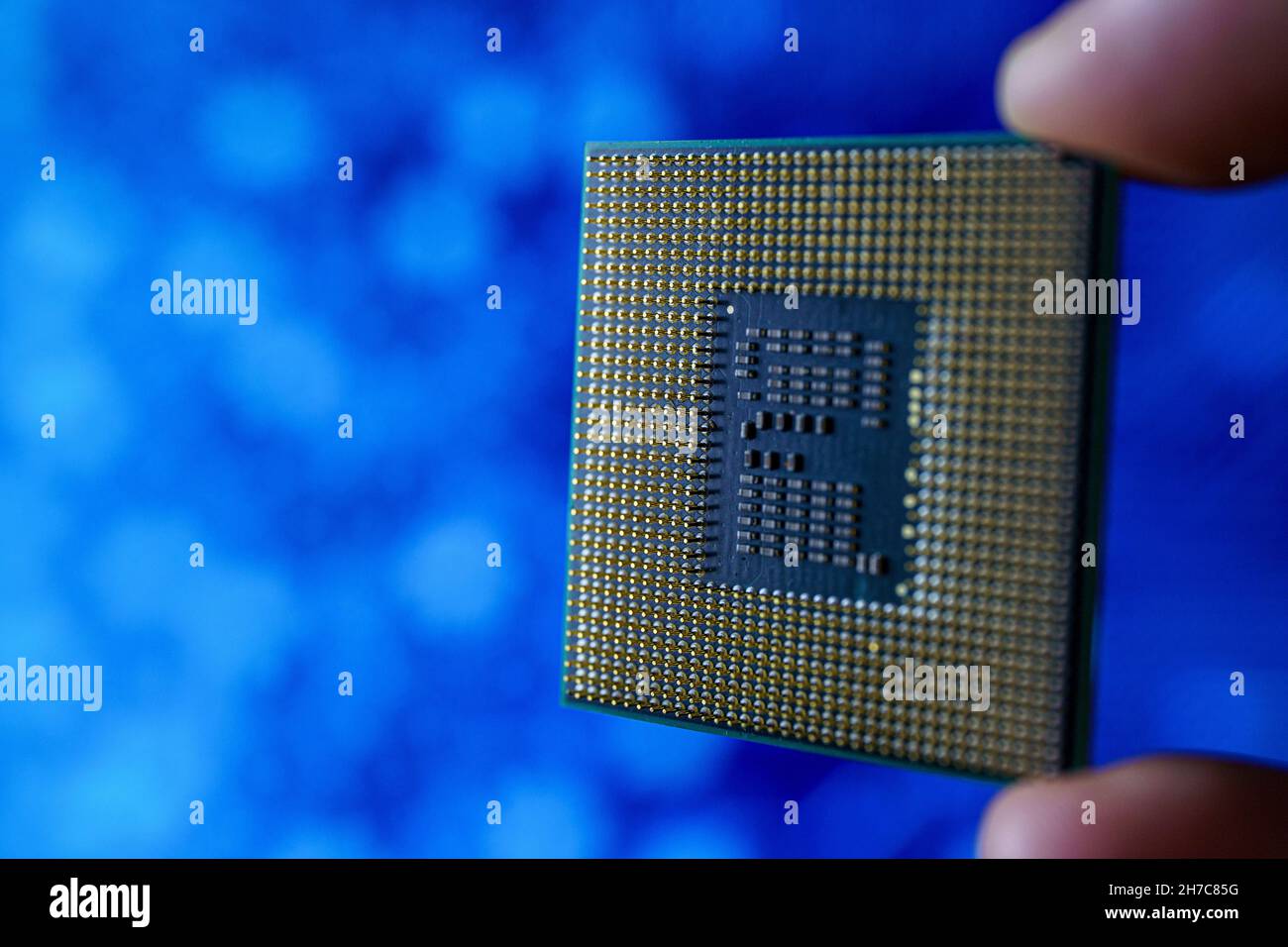 Computer chip in hands. A chipset is a set of electronic component that is integrated and flows