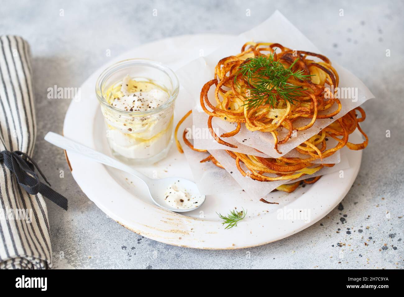 Hash brown potato with white sauce. Potato Pancakes. delicious
