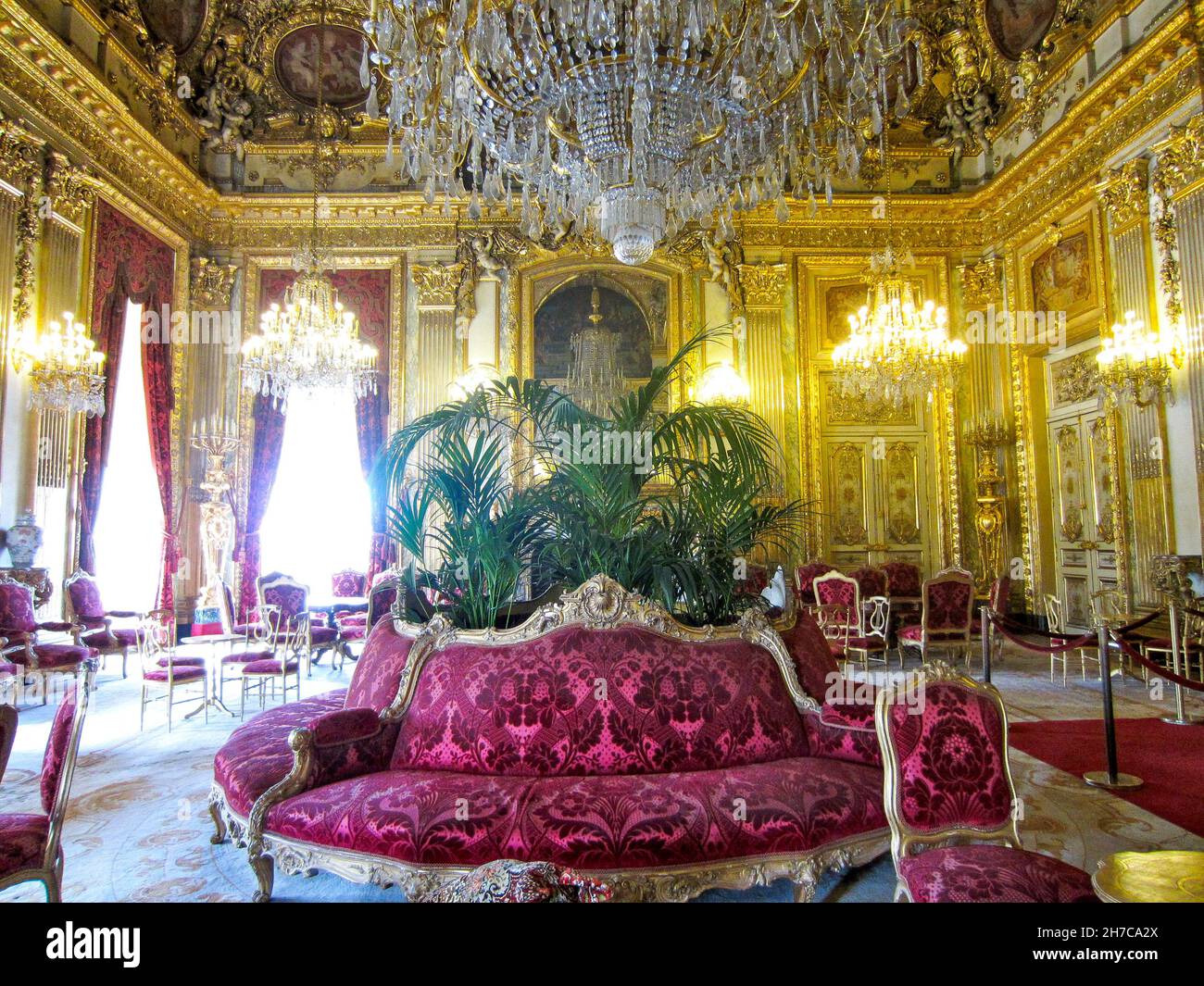 PARIS, FRANCE - Sep 12, 2021: A view of the Napoleonic Apartments in the red boudoir in the Louvre Museum, France Stock Photo