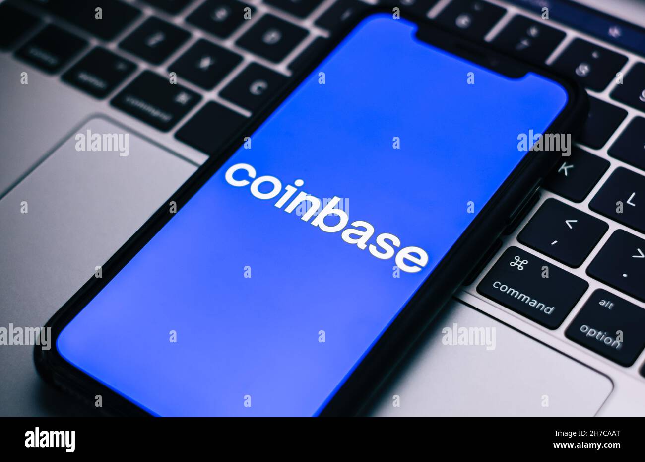Coinbase logo on smartphone screen. Stock Photo