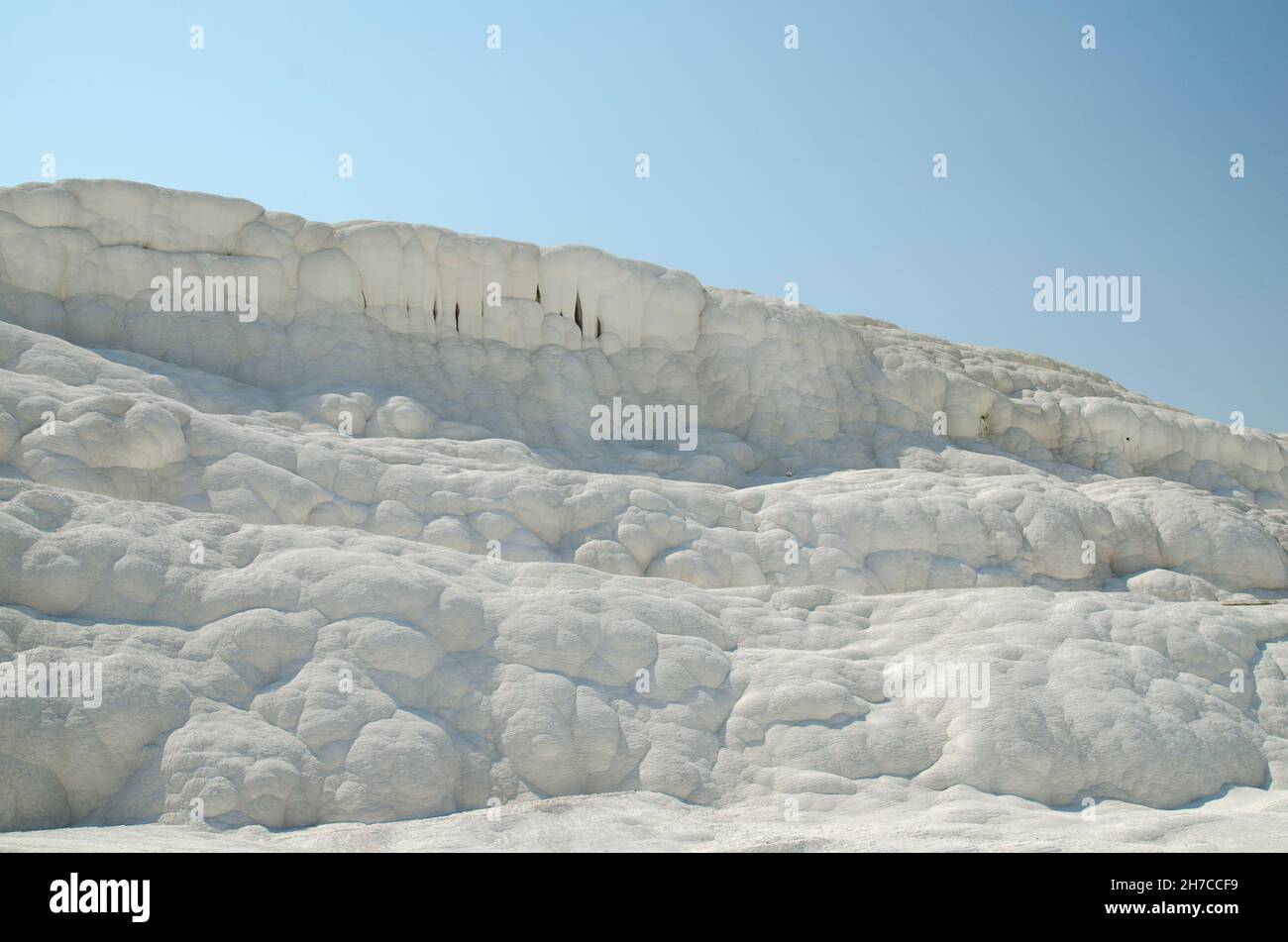 Salt mountains of Pamukkale, Turkey. Snow white hills of natural resort Stock Photo