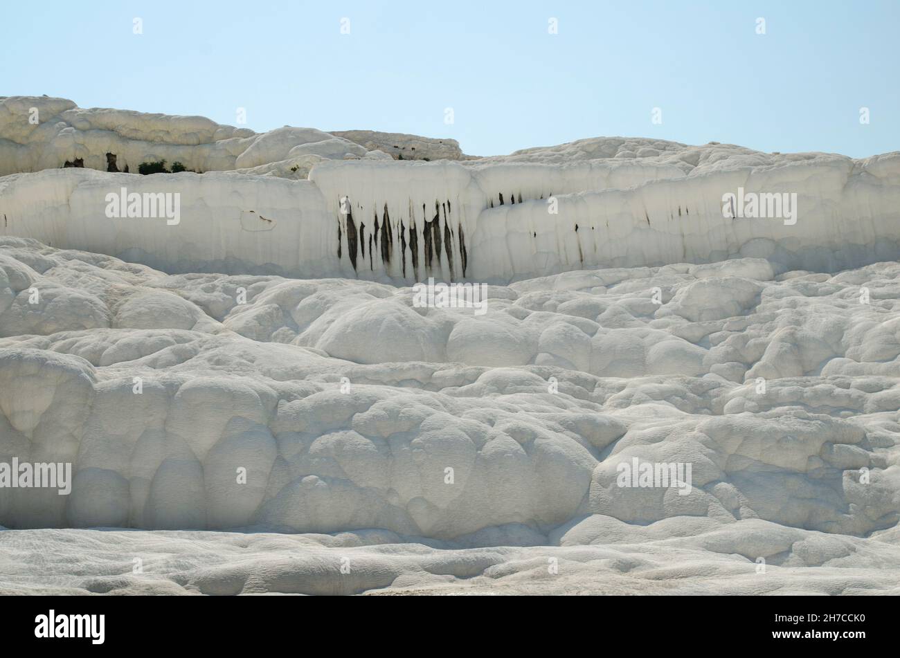 White hills of Pamukkale, Turkey. Snow mountains and caves Stock Photo