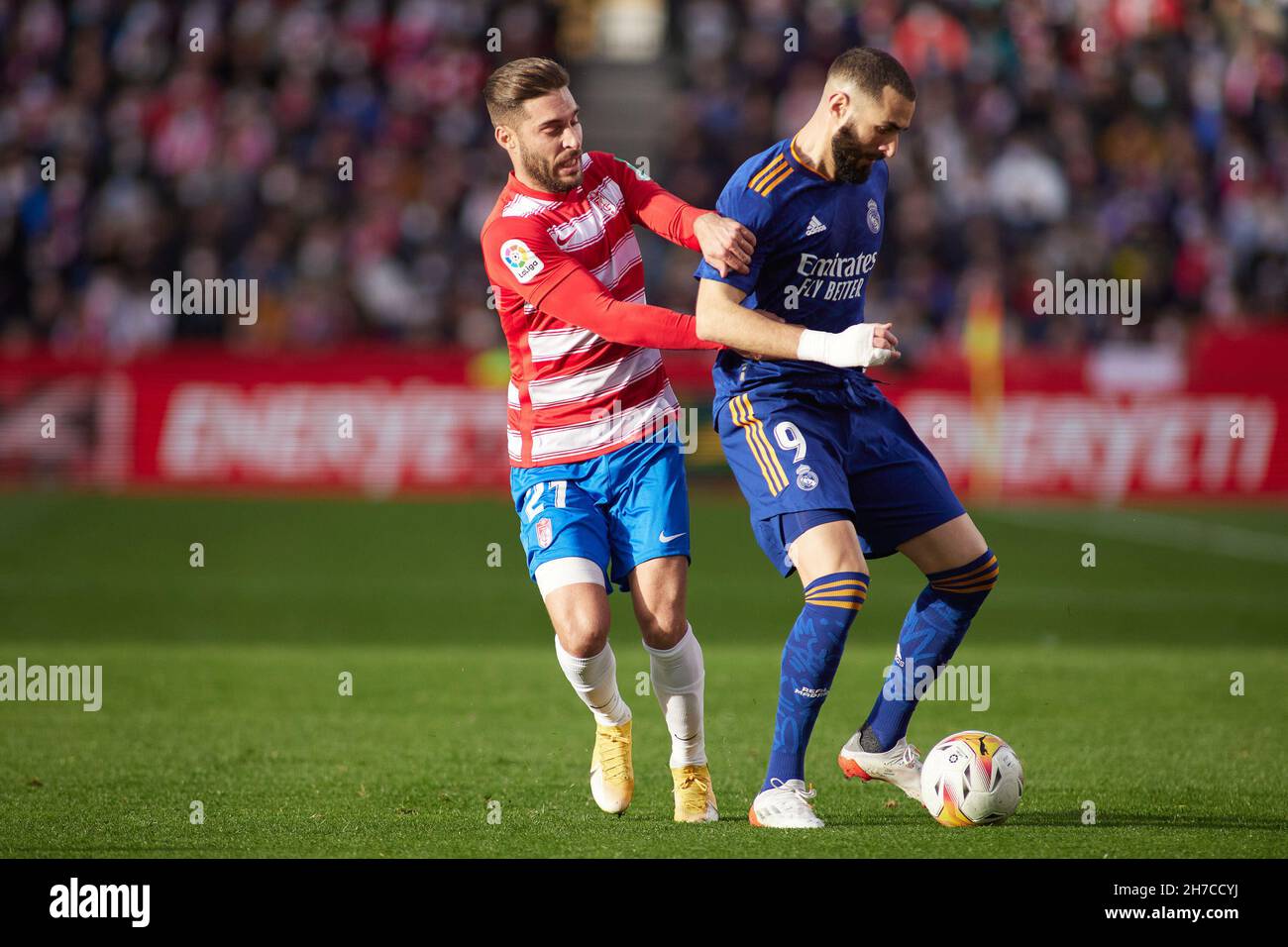 Rubén Rochina Ruben Rochina of Granada and Karim Benzema of Real Madrid during the ...