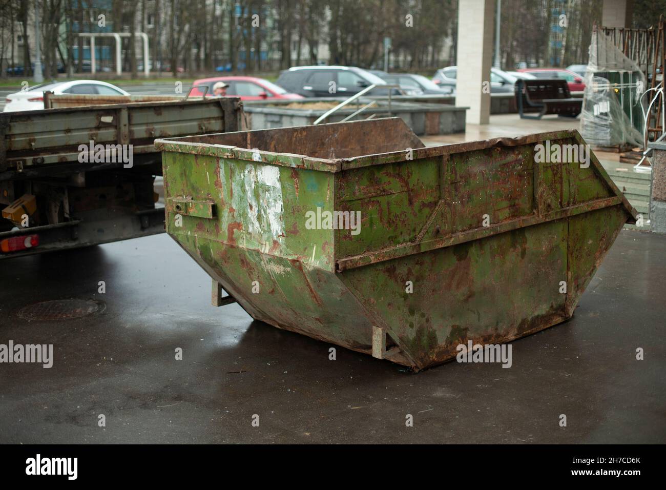 Container for garbage in the suburbs. Garbage can for waste. Removal of