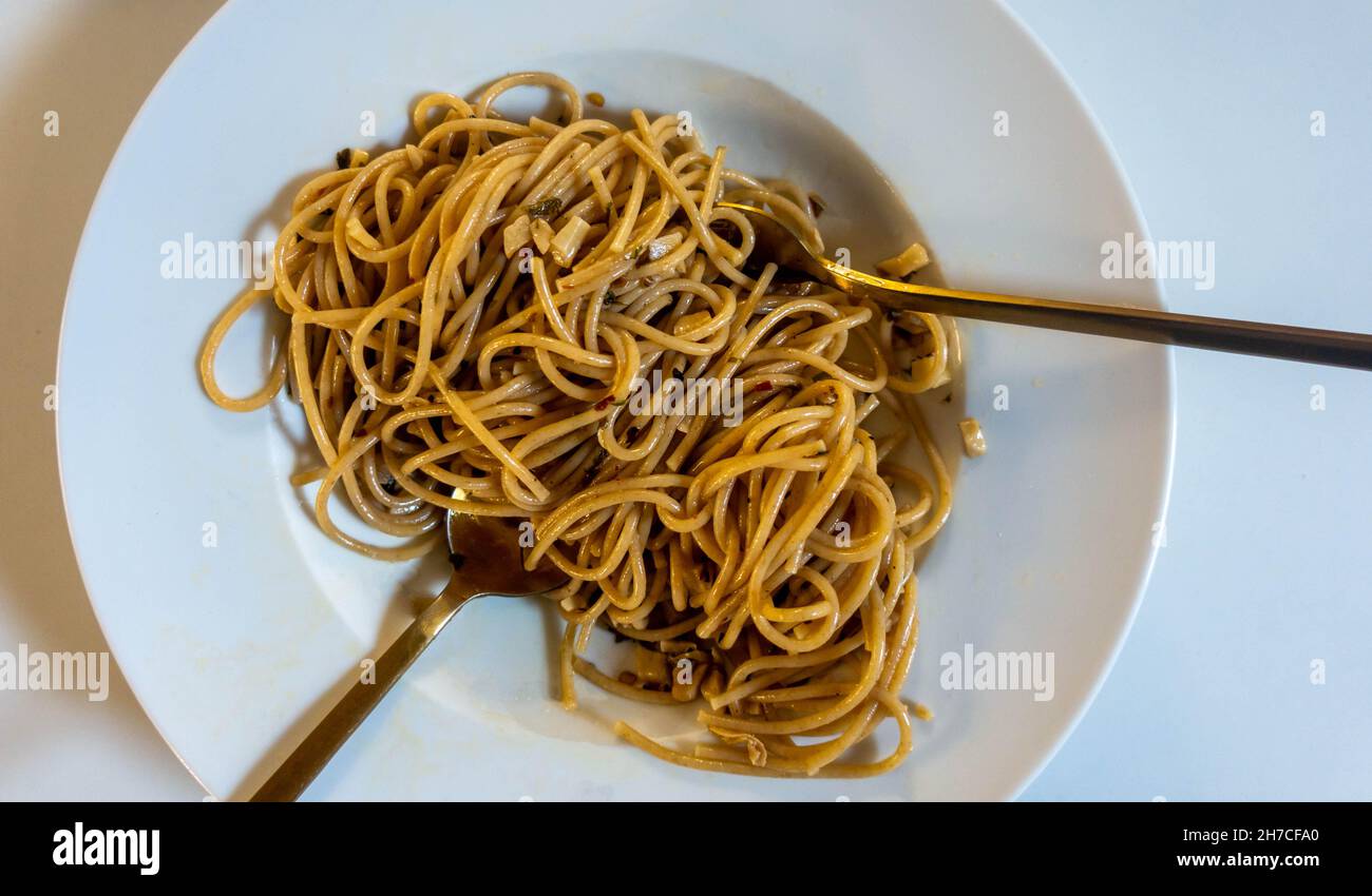 A bowl of spaghetti Aglio e Olio (garlic and oil) Stock Photo