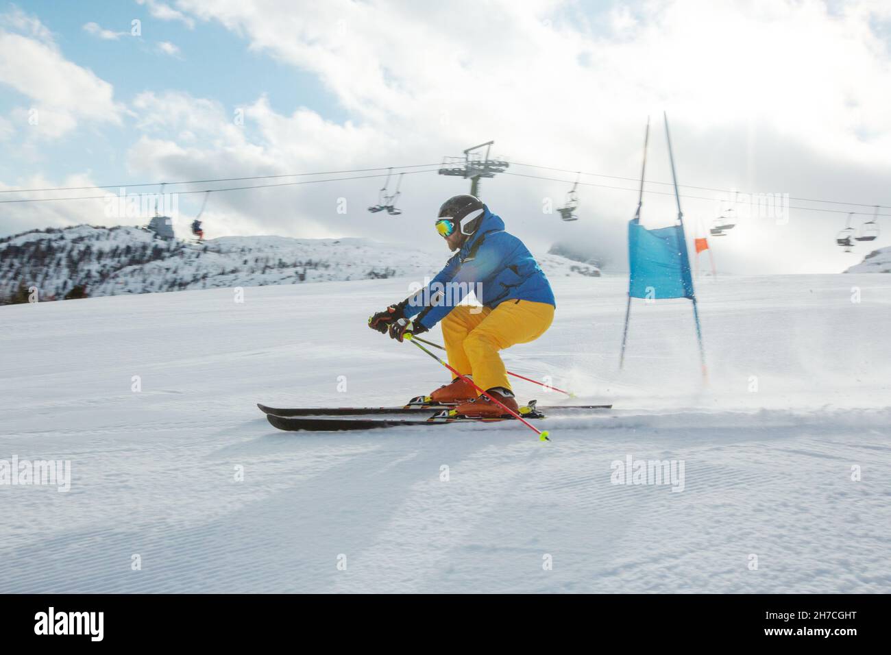 Gs Giant Slalom alpine ski racer skiing down the slope with gates sport