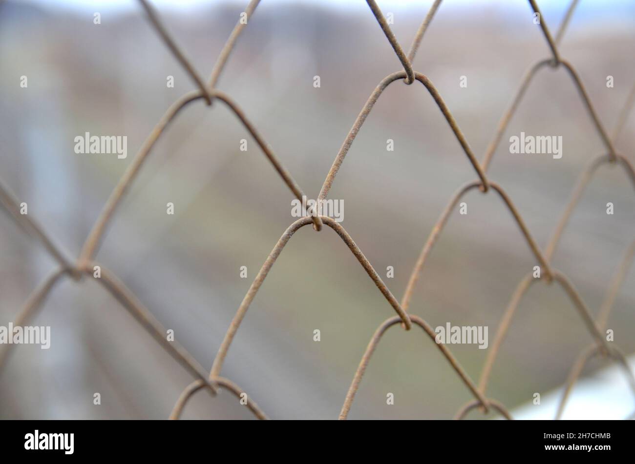 Old rusty chain link grid fence close view, prison concept Stock Photo ...