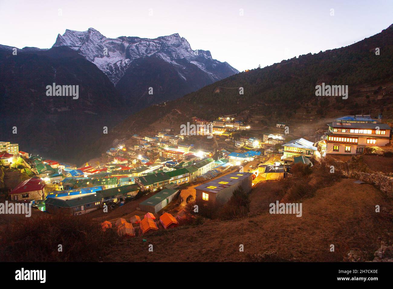 Night view of Namche Bazar village and mount Kongde - trek to Everest base camp - Nepal Himalayas mountains Stock Photo