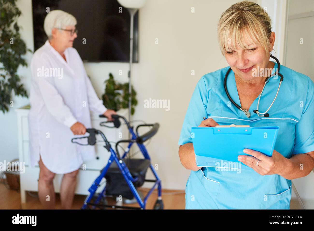 Caregiver with checklist on clipboard checks cleanliness and hygiene in