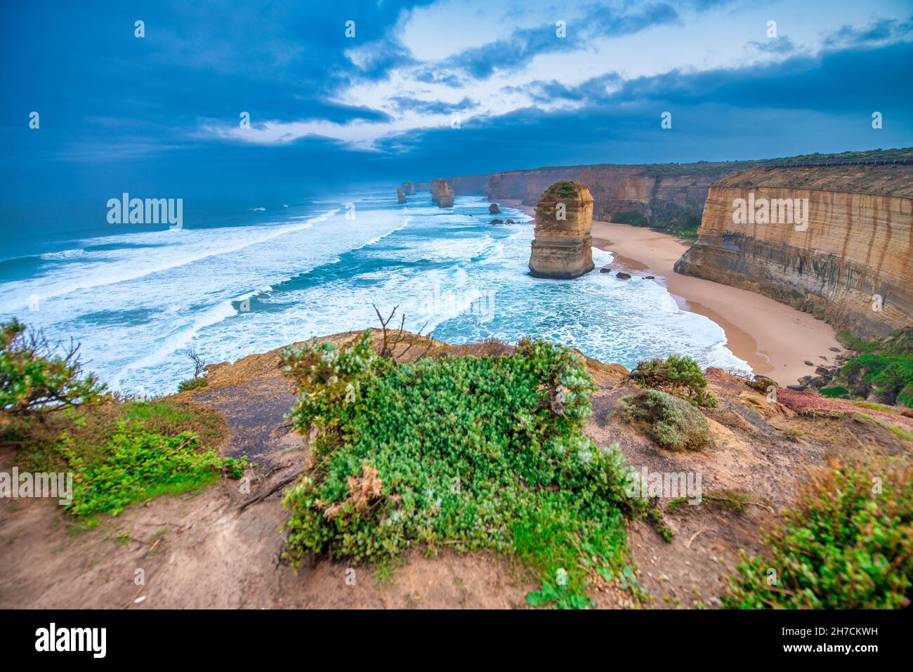 Aerial view of amazing Twelve Apostles during a stormy sunset, Port