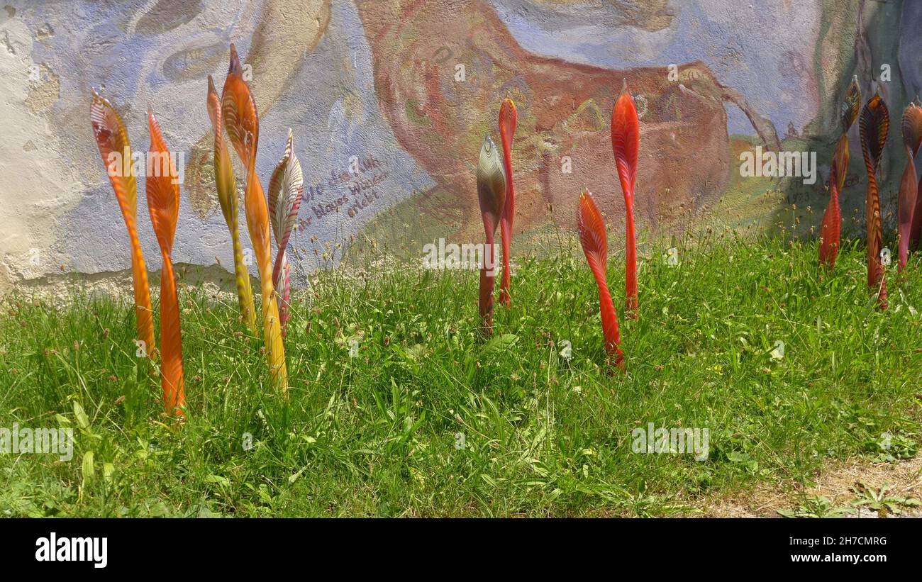 glass art objects on a meadow, Germany Stock Photo