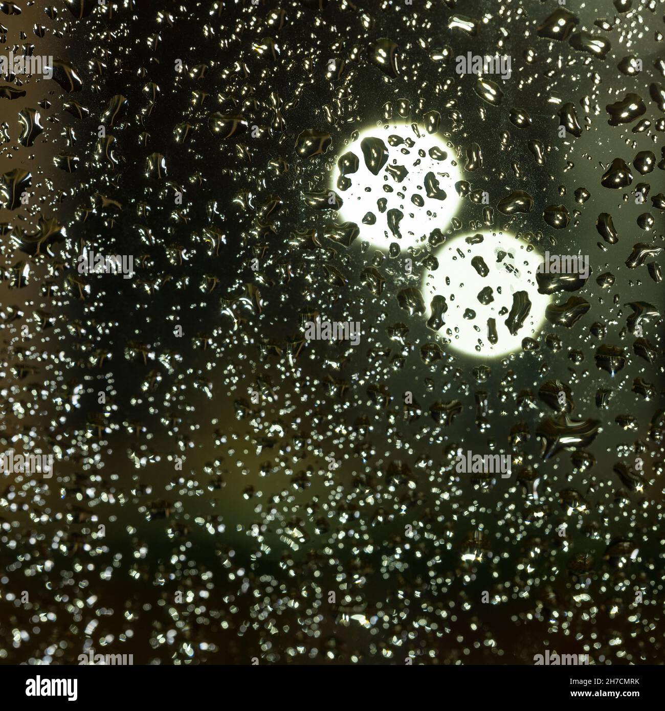 Window Sharp Light colorful diffuse unsharp lights behind glass window with rain drops ...