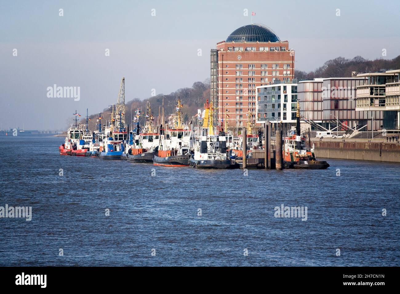Hamburg harbor tugs at former coldstore Neumuehlen, now retirement home, Germany, Hamburg, Port of Hamburg Stock Photo