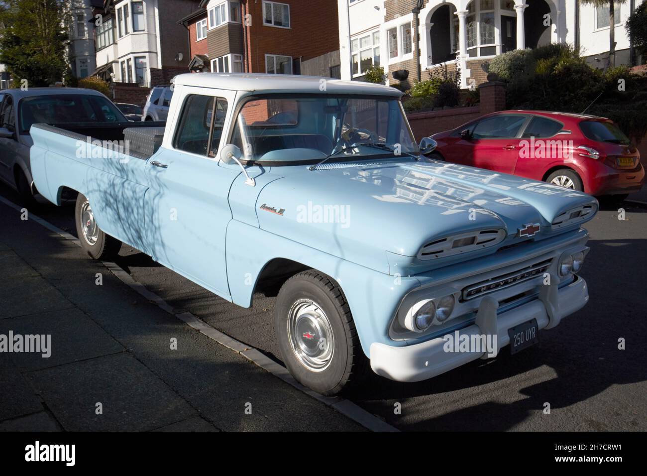 vintage 1961 chevrolet apache 10 pickup truck in dawn blue and white New Brighton the Wirral merseyside uk Stock Photo