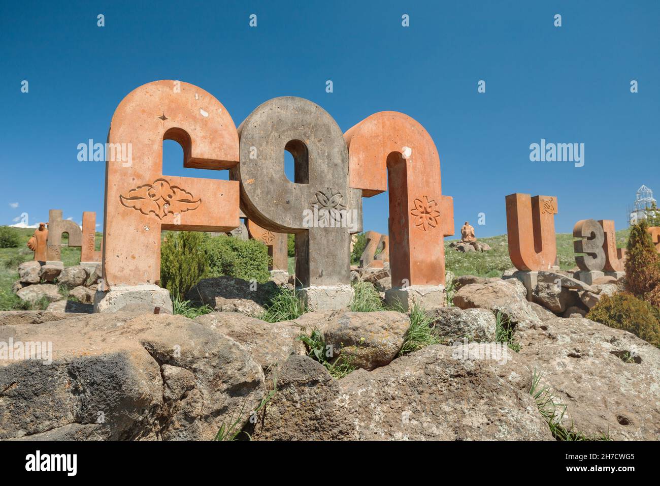 19 May 2021, Aragatsotn, Armenia: Armenian alphabet monument with stone sculptures of letters and Mesrop Mashtots Stock Photo