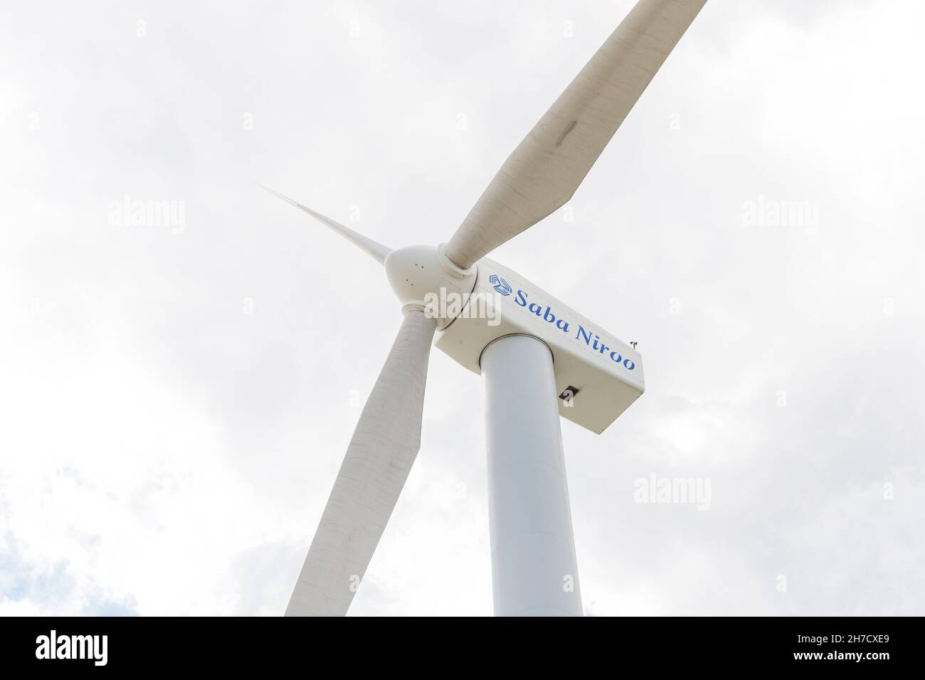 19 May 2021, Pushkin Pass, Armenia: Saba Niroo Iranian company logo on a windmill power farm Stock Photo