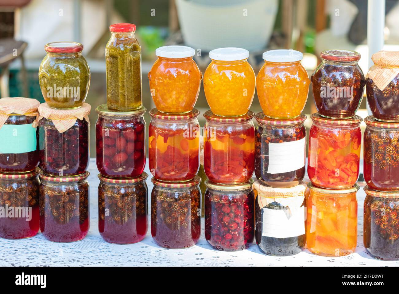 Assortment of various glass jars with jam. The concept of home-made preparations of healthy sweets Stock Photo
