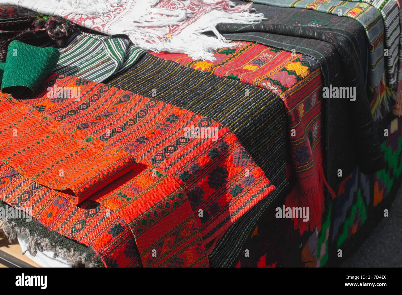 Traditional vintage ukrainian clothes, embroidered towels on flea