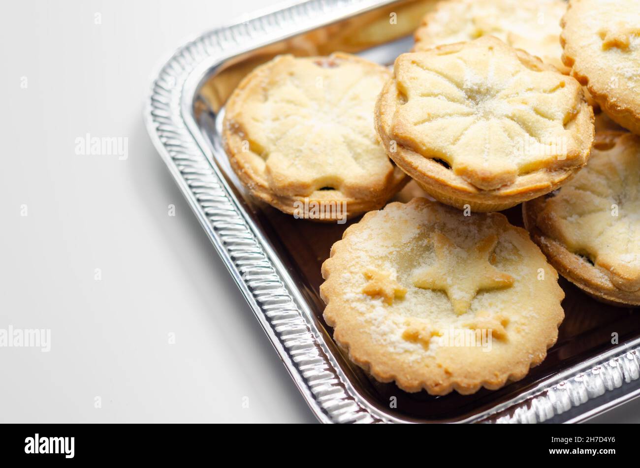 Allbutter pastry pies with a mincemeat filling with spiced vine fruits