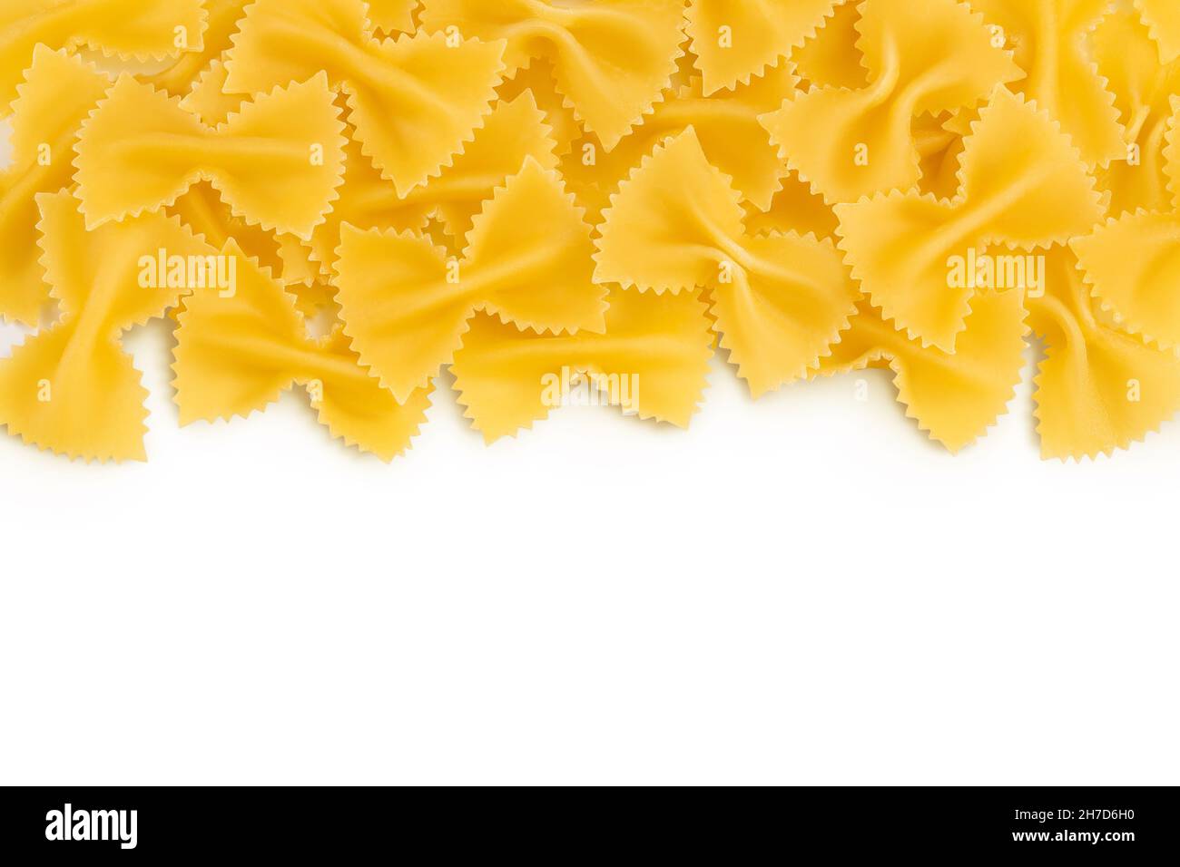 Bow tie pasta isolated on white background with clipping path and full