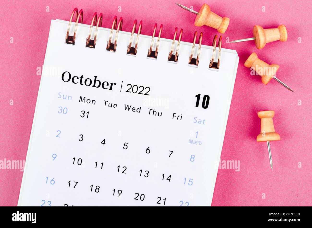 October 2022 Desktop Calendar Close Up October 2022 Desk Calendar With Wooden Pin On Pink Background  Stock Photo - Alamy