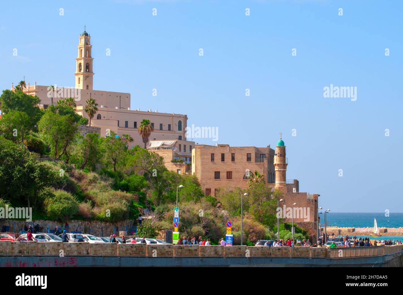 Israel, Old Jaffa as seen from the North.  The entrance to the ancient port on the right and the belfry of the Church and Monastery of St Peter in the Stock Photo