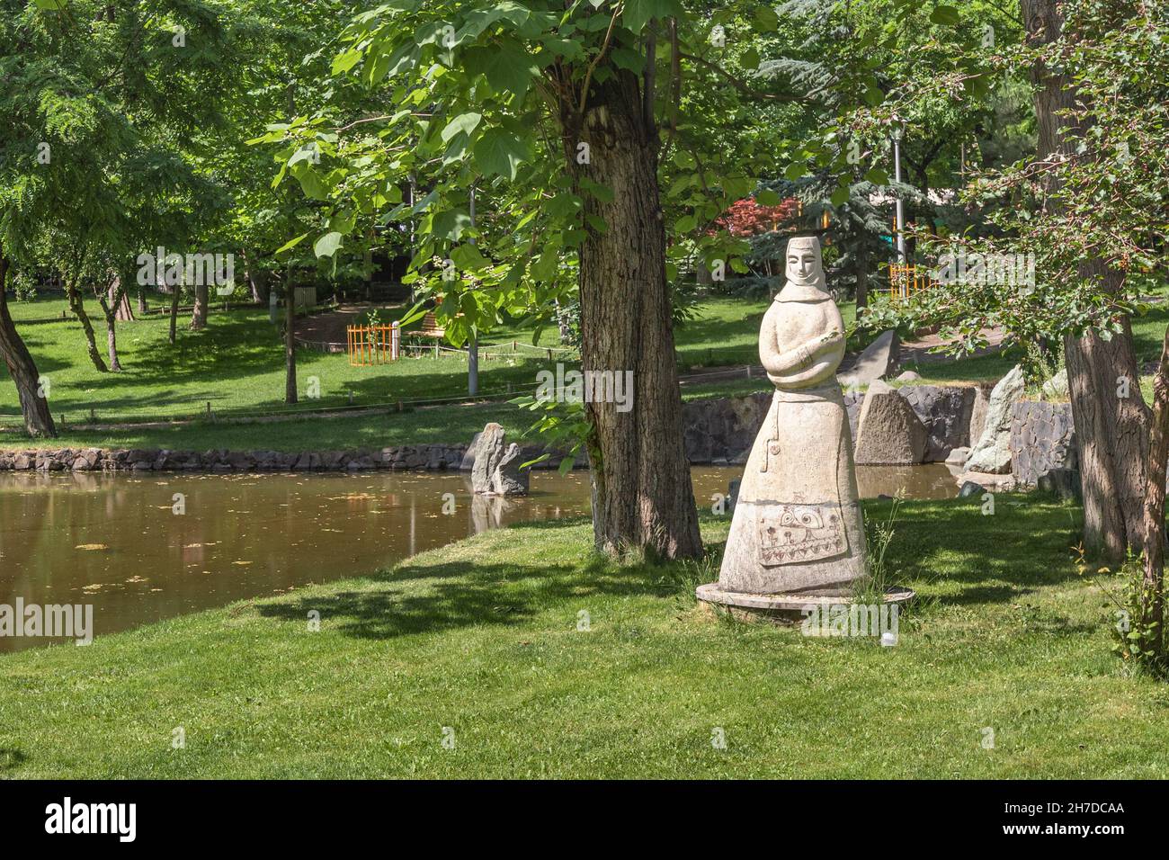 25 May 2021, Yerevan, Armenia: Armenian woman statue in Boghossian gardens or Lovers Park in center of Yerevan city Stock Photo