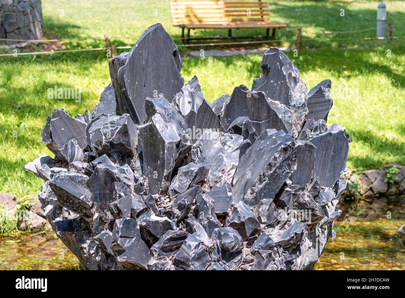 Black stone obsidian or volcanic glass. It was used by shamans of the Aztec  tribe for sacrifices and rituals Stock Photo - Alamy, image size:1300x956