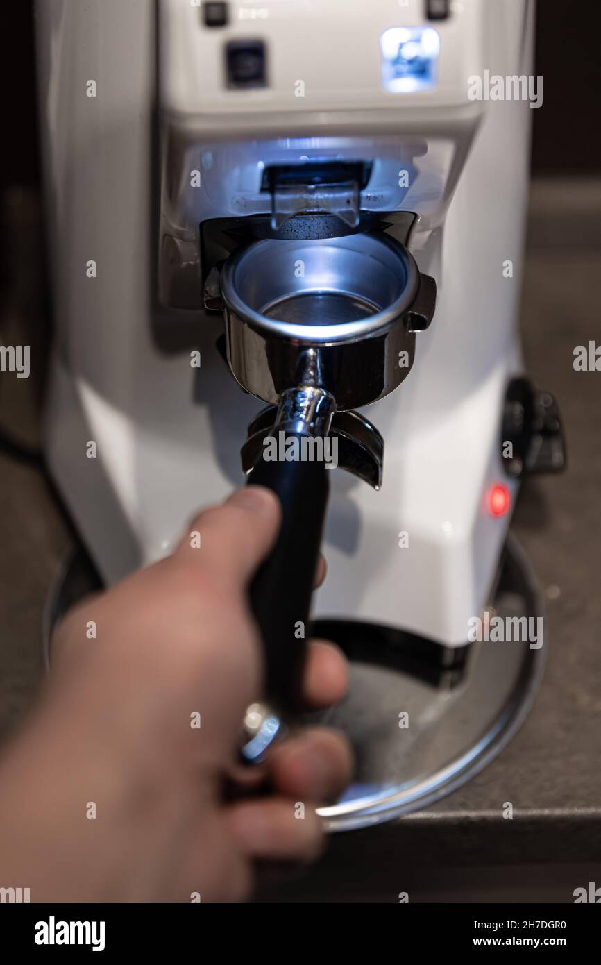 Closeup part of a coffee machine, a holder for coffee Stock Photo Alamy