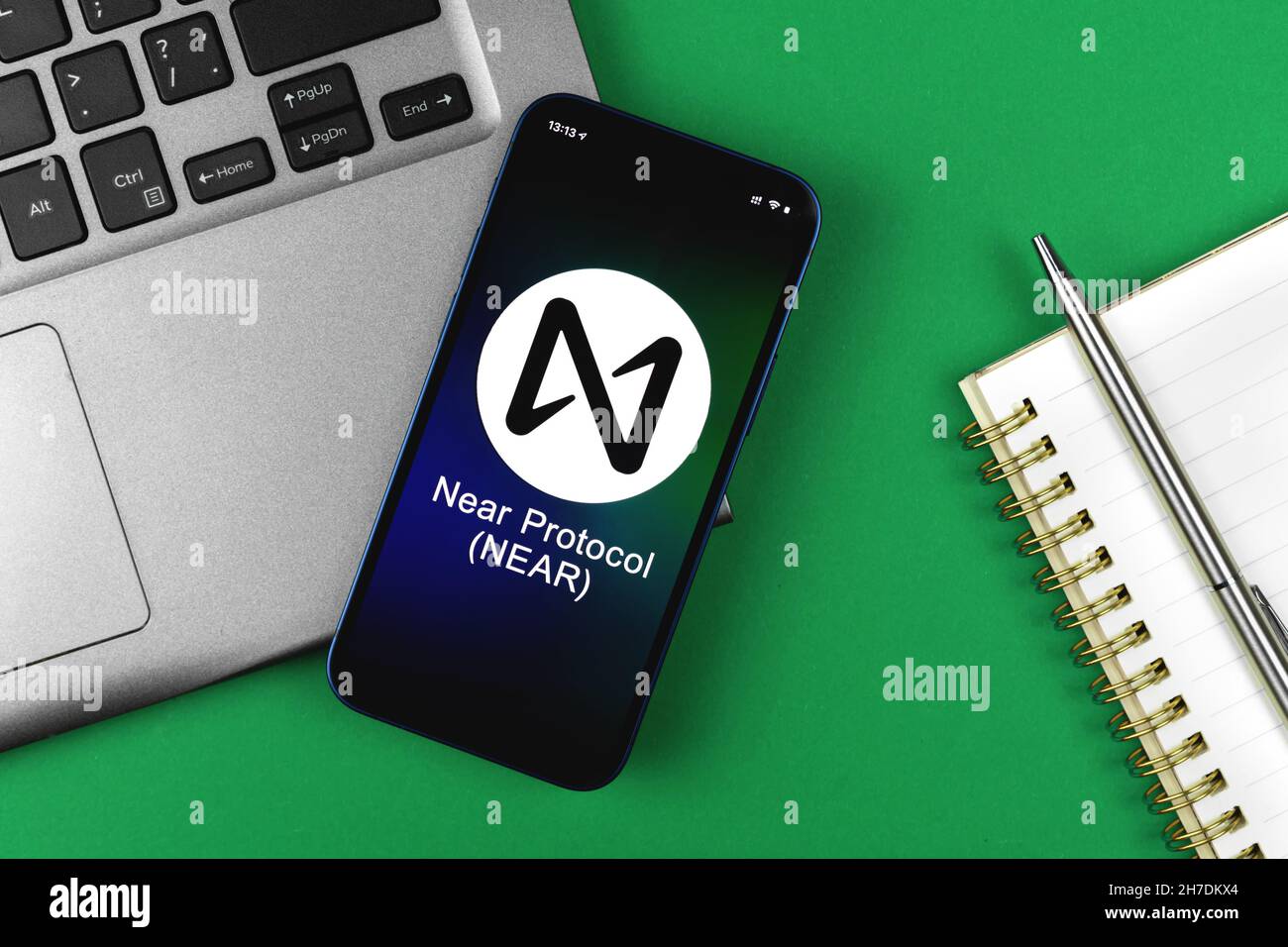 Near Protocol symbol. Trade with cryptocurrency, digital and virtual money,  banking with mobile phone concept. Business workspace, table top view Stock  Photo - Alamy