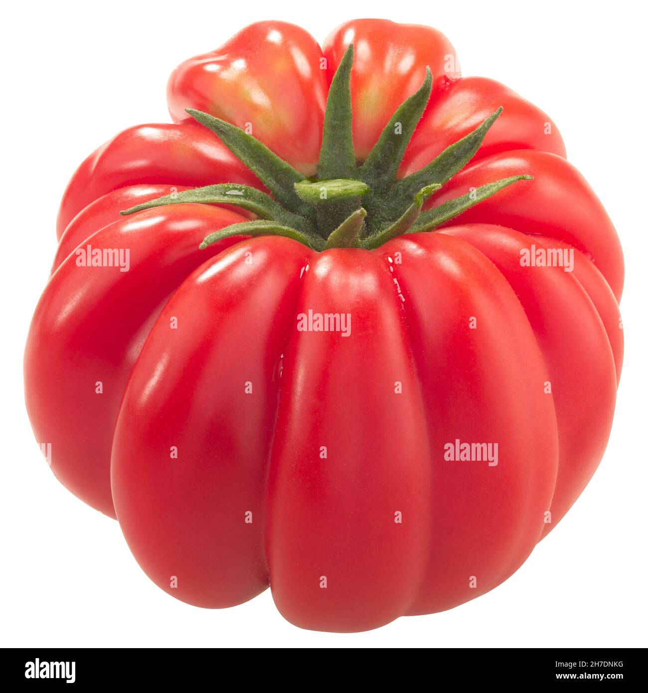 Ribbed heirloom tomato (Solanum lycopersicum fruit) isolated Stock Photo