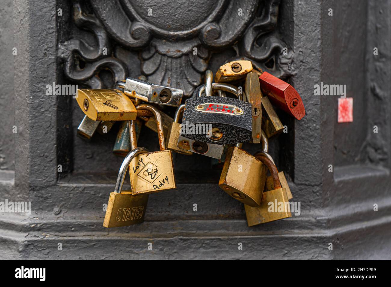 Love locks attached to a bridge over the Tiber in Rome, Italy Stock Photo