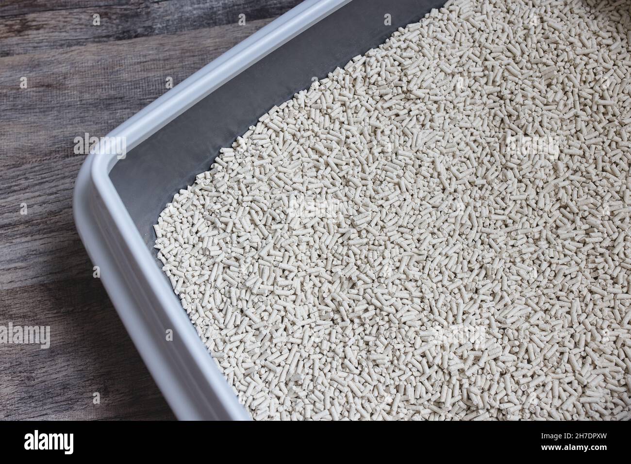 Cat litterbox with natural flushable biodegradable tofu litter. Ecofriendly product for indoor