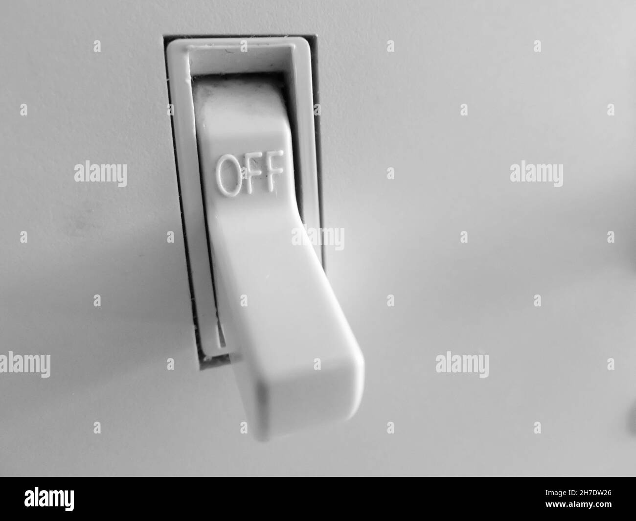 Closeup of on off light switch for power in house grungy dirty Stock Photo