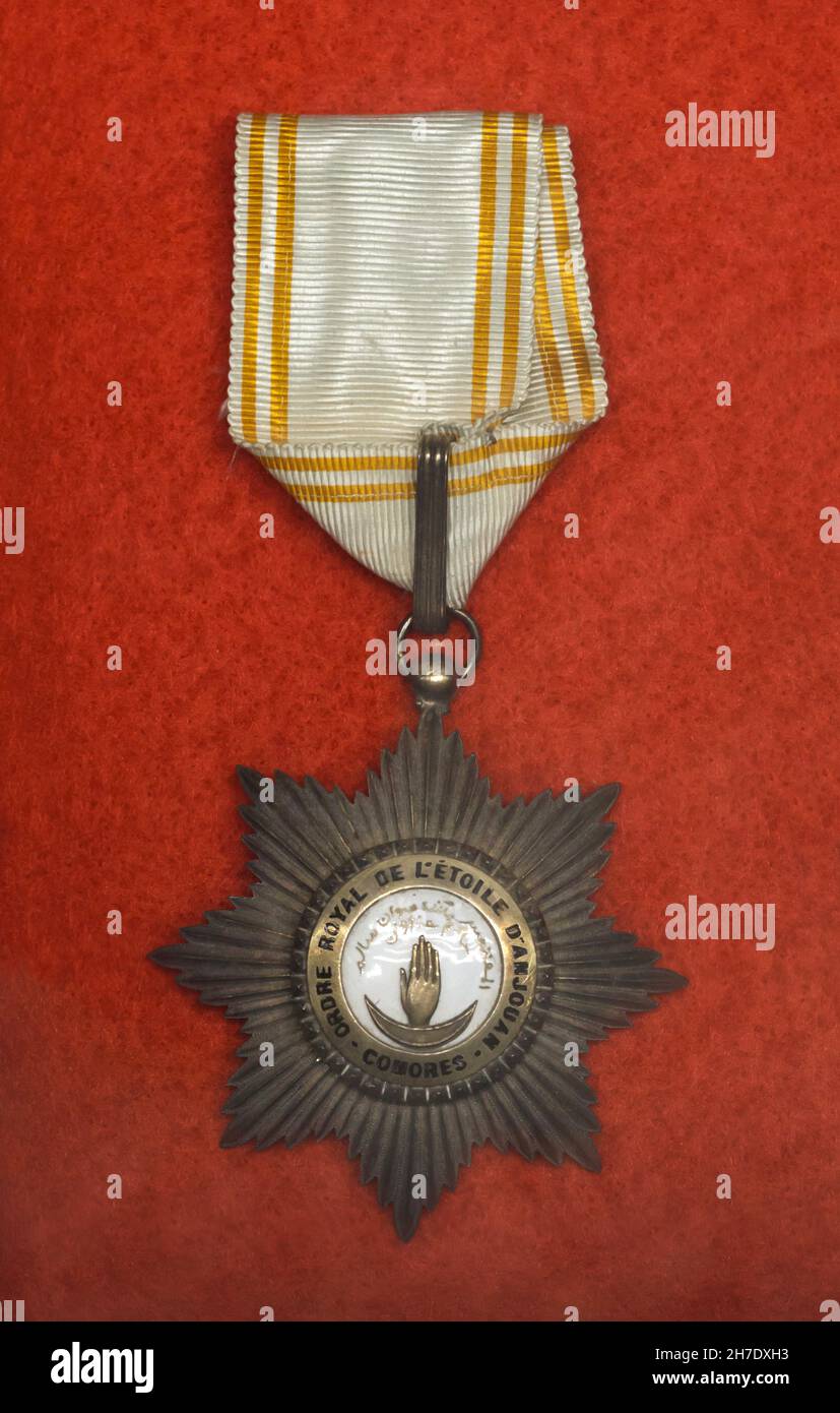 The Order of the Star of Anjouan (Ordre de l'Étoile d'Anjouan) on display in the Armistice Museum in the Forest of Compiègne (Forêt de Compiègne) near Compiègne in France. French general Louis Auguste Adrian (1859 – 1933) was awarded by this French colonial order established on the Comoros island of Anjouan. The Armistice Museum is located on the ground of the Glade of the Armistice where the Armistice of 11 November 1918 that ended the First World War was signed. Stock Photo