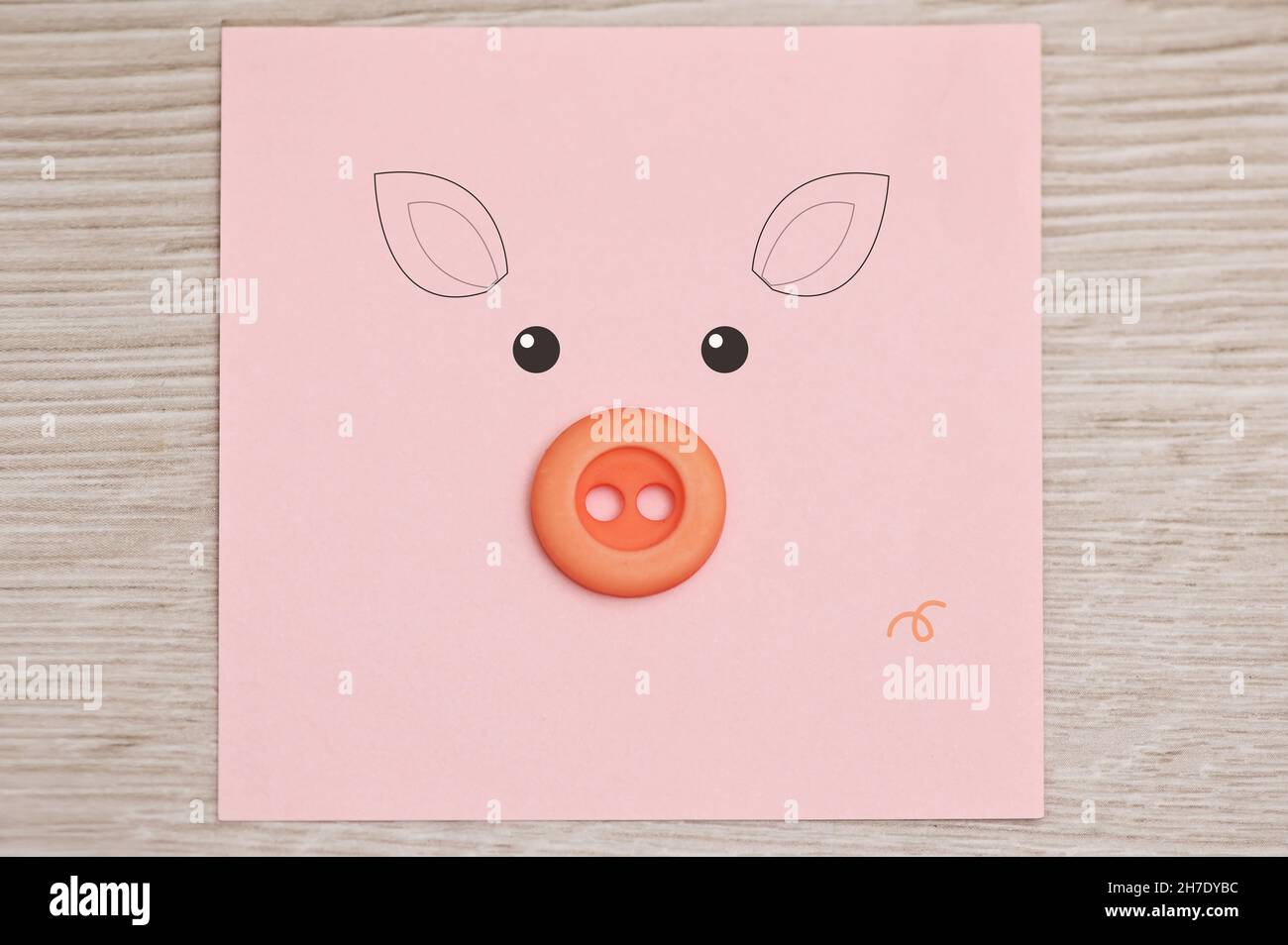 Conceptual Pig Craft from Post-It Notes and Button Stock Photo