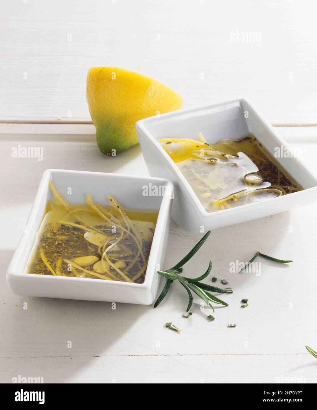 Rosemary and lemon grill marinade with garlic and oil Stock Photo Alamy