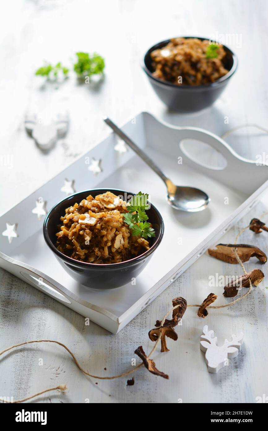 Risotto with dried mushrooms Stock Photo Alamy