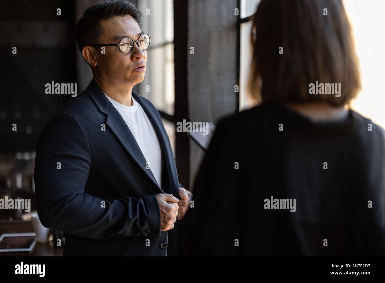 Business people talking during work in cafe Stock Photo